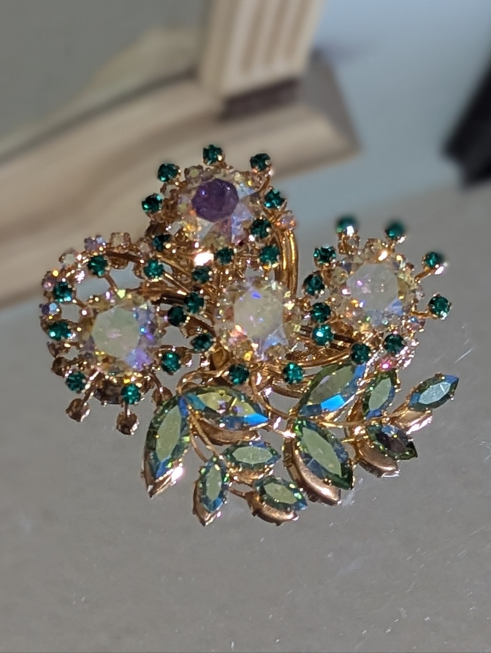 Gold-Tone Floral Crystal Brooch with Emerald and Aurora Borealis Stones